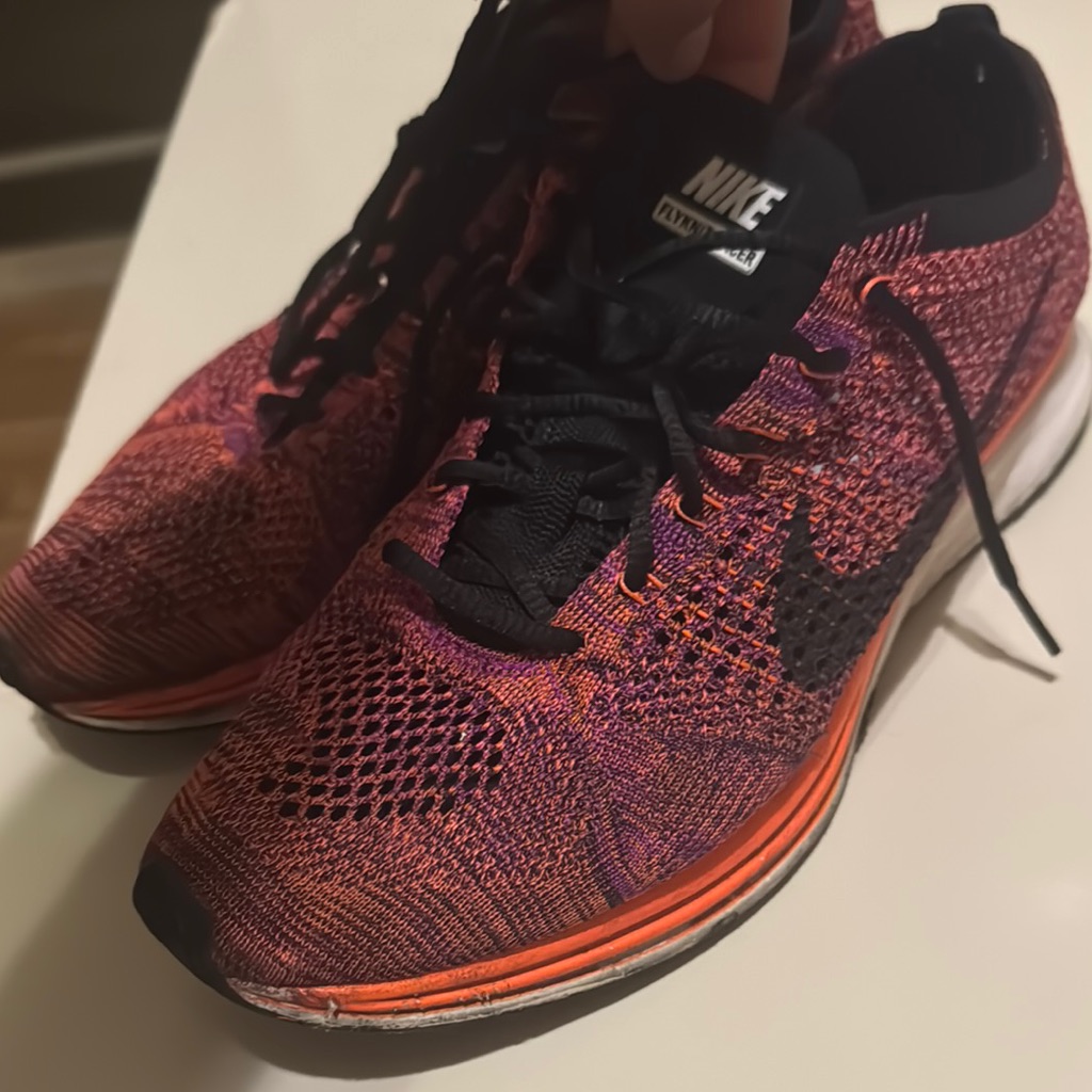 Nike Flyknit Running Shoes - Black And Orange
